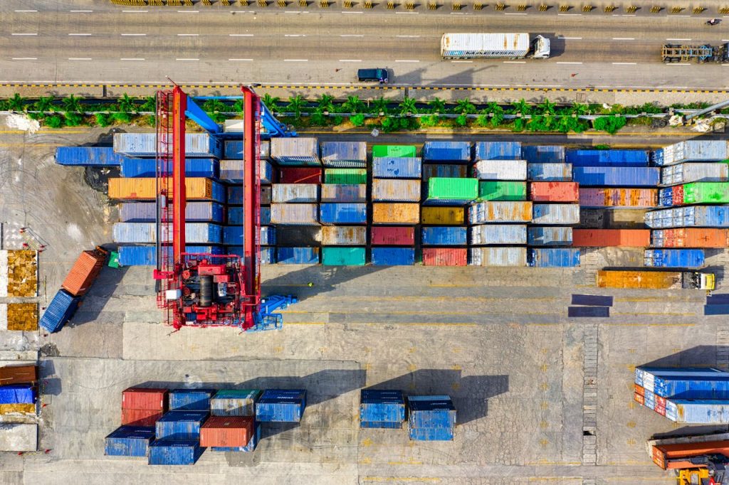 aerial-view-of-containers-2231742 Colorful cargo containers organized at a shipping yard in North Jakarta, Indonesia.